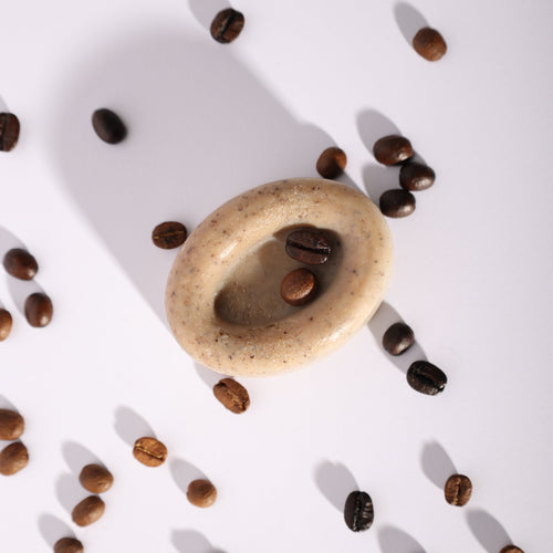 Handmade exfoliating coffee scrub soap with natural ingredients