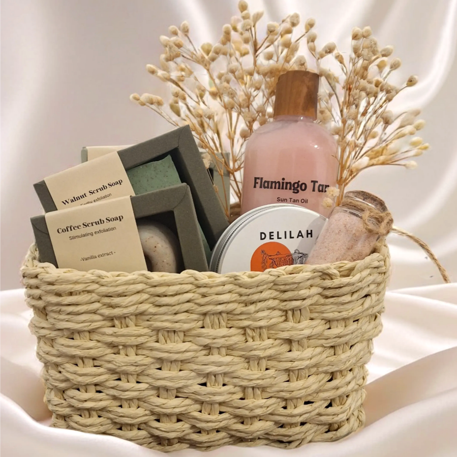 Seasonal skincare gift set with tanning oil and exfoliating scrubs