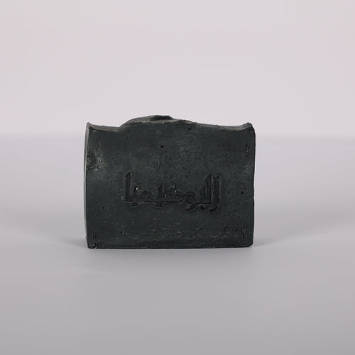 Deep-cleansing handmade activated charcoal soap for oily and acne-prone skin